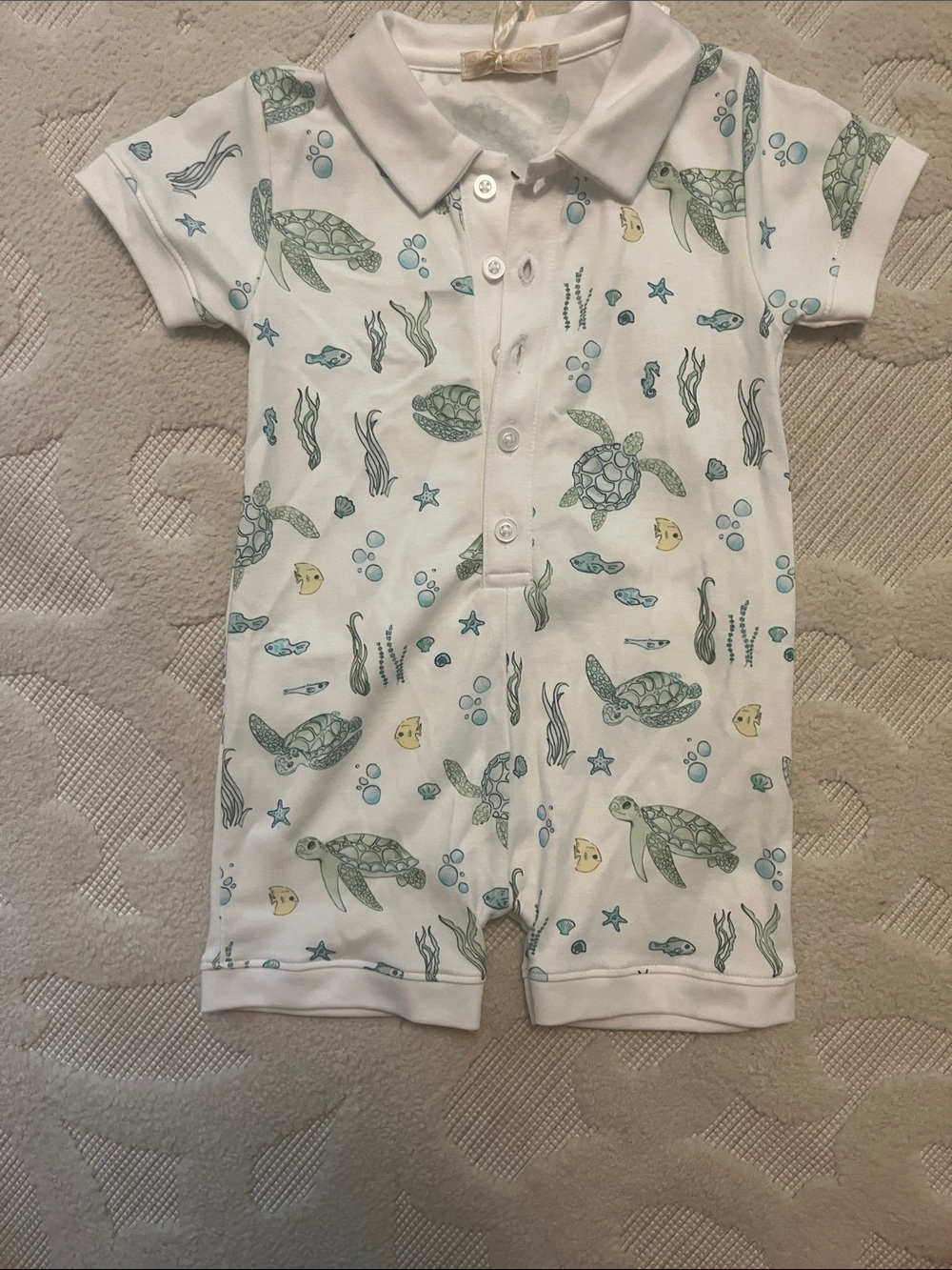 Polo-Style Baby One-Piece with Turtle Print in White